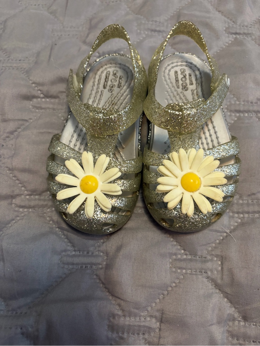 CROCS Kids Glitter Jelly Sandals with Daisy Accent — Gold